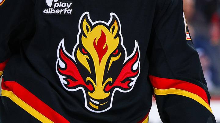 Mar 5, 2026; Calgary, Alberta, CAN; Calgary Flames defenseman Zach Whitecloud (28) against the Ottawa Senators during the third period at Scotiabank Saddledome. Mandatory Credit: Sergei Belski-Imagn Images