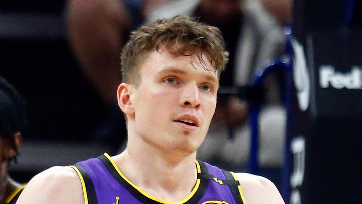 Los Angeles Lakers forward LeBron James (23) and guard Dalton Knecht (4) react during the second quarter against the Memphis Grizzlies at FedExForum on March 29, 2025.
