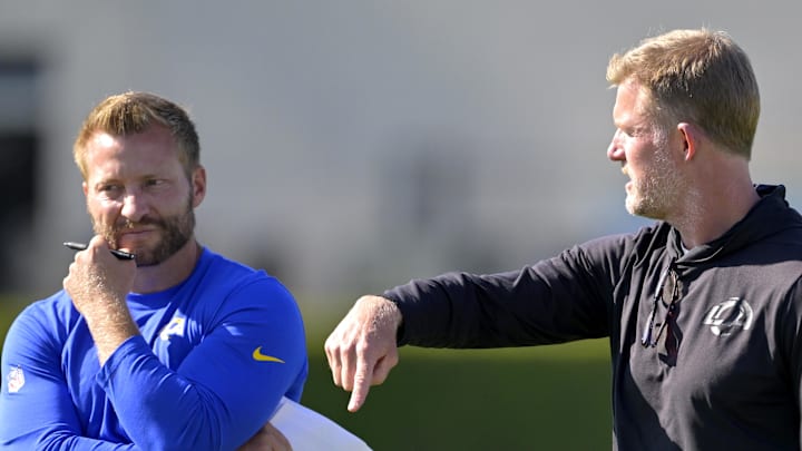 Jul 29, 2024; Los Angeles, CA, USA; Los Angeles Rams head coach Sean McVay, general manager Les Snead and chief of staff Carter Crutchfield talk on the field during training camp at Loyola Marymount University. Mandatory Credit: Jayne Kamin-Oncea-Imagn Images Jul 29, 2024; Los Angeles, CA, USA; Los Angeles Rams head coach Sean McVay, general manager Les Snead and chief of staff Carter Crutchfield talk on the field during training camp at Loyola Marymount University. Mandatory Credit: Jayne Kamin-Oncea-Imagn Images