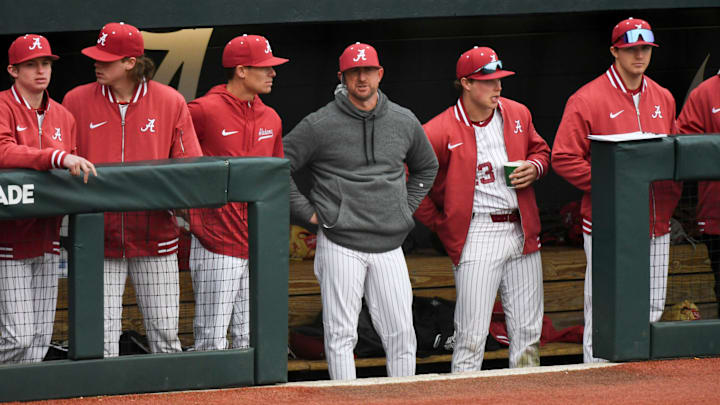 Feb 17, 2024; Tuscaloosa, Alabama, USA; New Alabama head baseball coach Rob Vaughn watches his team perform in the game with Manhattan at Sewell-Thomas Stadium Saturday.