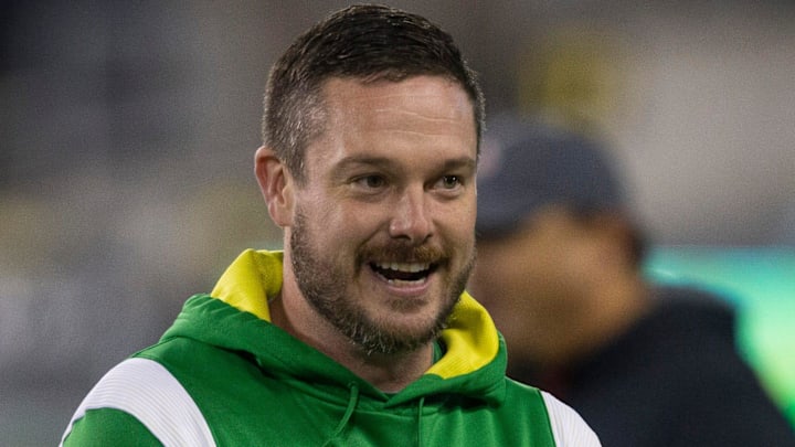 Oregon coach Dan Lanning joins his team during warmups before their game against Utah in final home game of season at Autzen Stadium.

Ncaa Football Oregon Utah Football Utah At Oregon
