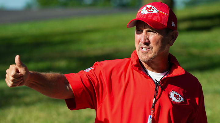 Kansas City Chiefs defensive coordinator Steve Spagnuolo greets fans as he takes the field for training camp at Missouri Western State University.