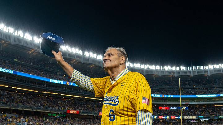 Joe Torre raises his cap to a sold out crowd at Yankees Stadium as he coaches 1st base for the Savannah Bananas - Savannah Bananas Twitter Page: @TheSavBananas