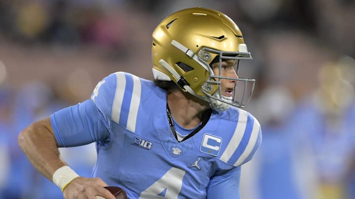 Nov 8, 2024; Pasadena, California, USA; UCLA Bruins quarterback Ethan Garbers (4) looks to pass in the first half against the Iowa Hawkeyes at the Rose Bowl. Mandatory Credit: Jayne Kamin-Oncea-Imagn Images Nov 8, 2024; Pasadena, California, USA; UCLA Bruins quarterback Ethan Garbers (4) looks to pass in the first half against the Iowa Hawkeyes at the Rose Bowl. Mandatory Credit: Jayne Kamin-Oncea-Imagn Images