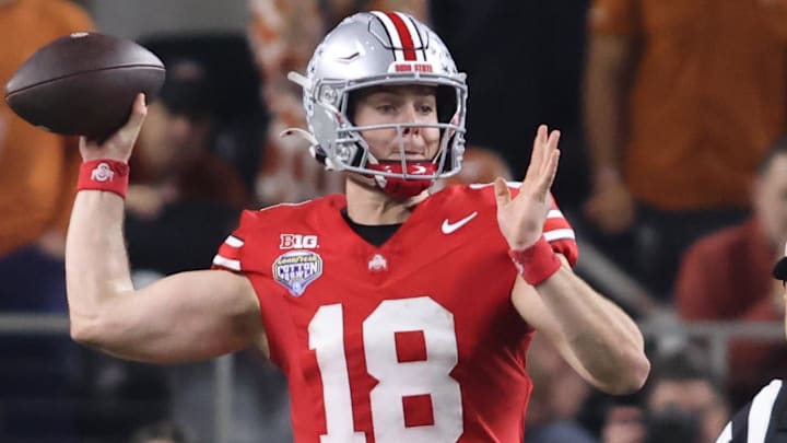 Jan 10, 2025; Arlington, Texas, USA; Ohio State Buckeyes quarterback Will Howard (18) throws during the fourth quarter of the College Football Playoff semifinal against the Texas Longhorns in the Cotton Bowl at AT&T Stadium. Mandatory Credit: Tim Heitman-Imagn Images