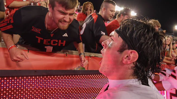 Oct 4, 2025; Houston, Texas, USA; Texas Tech Red Raiders quarterback Behren Morton (2) celebrate with fans after defeating the Houston Cougars 35 tom 11 at TDECU Stadium. Mandatory Credit: Thomas Shea-Imagn Images