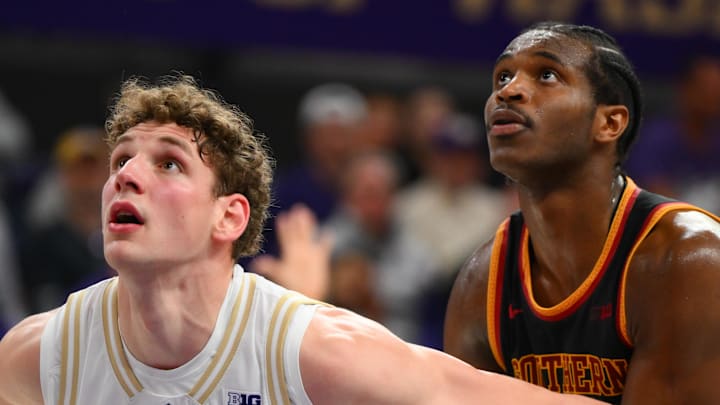Mar 4, 2026; Seattle, Washington, USA; Washington Huskies forward Hannes Steinbach (6) blocks out Southern California Trojans forward Ezra Ausar (2) during the second half at Alaska Airlines Arena at Hec Edmundson Pavilion. Mandatory Credit: Steven Bisig-Imagn Images