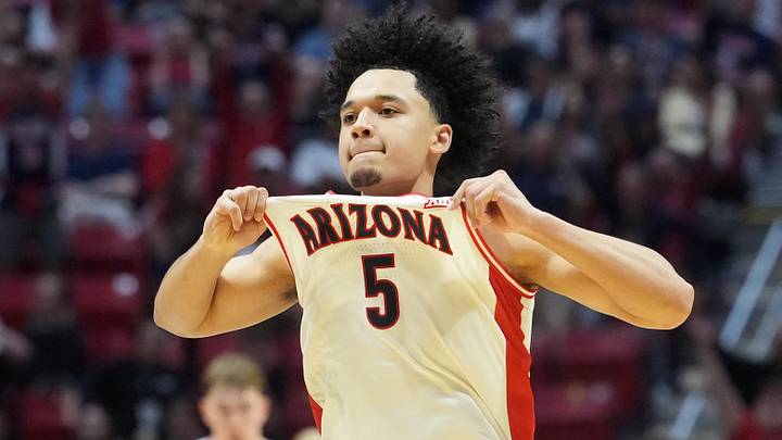 Mar 22, 2026; San Diego, CA, USA; Arizona Wildcats guard Brayden Burries (5) reacts in the second half against the Utah State Aggies during a second round game of the men's 2026 NCAA Tournament at Viejas Arena. Mandatory Credit: Kirby Lee-Imagn Images