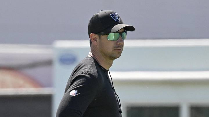 Las Vegas Raiders head coach Klint Kubiak looks on during organized team activities. Las Vegas Raiders head coach Klint Kubiak looks on during organized team activities.