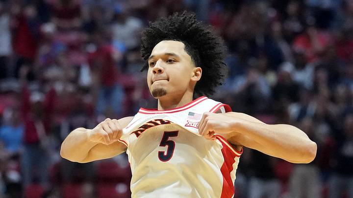 Arizona Wildcats guard Brayden Burries (5) reacts in the second half against the Utah State Aggies during a second-round game of the men's 2026 NCAA Tournament at Viejas Arena on March 22, 2026.