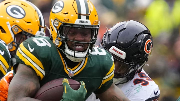 Green Bay Packers running back Josh Jacobs runs with the ball against the Chicago Bears last season at Lambeau Field. Green Bay Packers running back Josh Jacobs runs with the ball against the Chicago Bears last season at Lambeau Field.