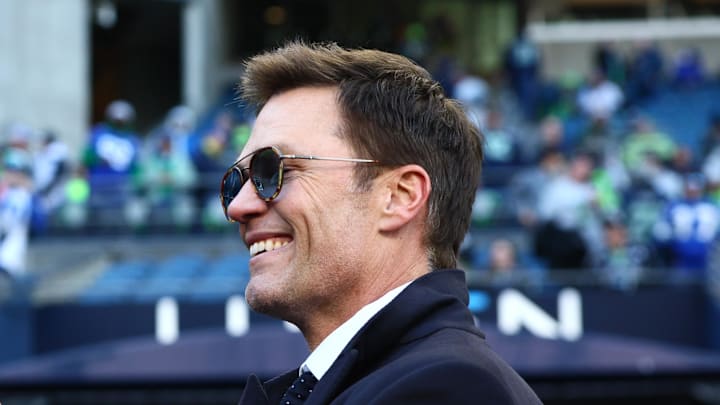 Jan 25, 2026; Seattle, WA, USA; Tom Brady signs autographs before the 2026 NFC Championship Game between the Seattle Seahawks and the Los Angeles Rams at Lumen Field. Mandatory Credit: Kevin Ng-Imagn Images