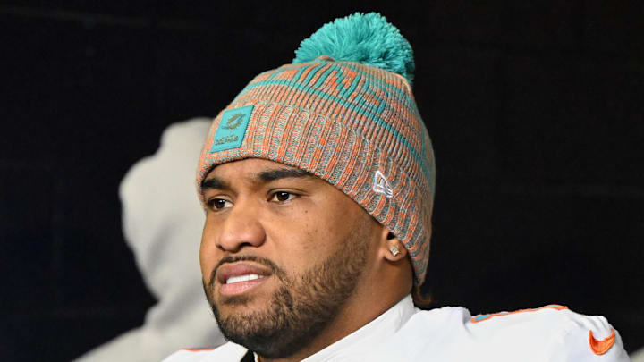 Jan 4, 2026; Foxborough, Massachusetts, USA; Miami Dolphins quarterback Tua Tagovailoa (1) walks out of the player tunnel before the game against the New England Patriots at Gillette Stadium. Mandatory Credit: Brian Fluharty-Imagn Images