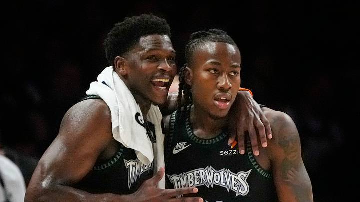 Apr 23, 2026; Minneapolis, Minnesota, USA; Minnesota Timberwolves guard Anthony Edwards (5) talks with guard Ayo Dosunmu (13) during a free throw by the Denver Nuggets in the first quarter at Target Center. Mandatory Credit: Bruce Kluckhohn-Imagn Images Apr 23, 2026; Minneapolis, Minnesota, USA; Minnesota Timberwolves guard Anthony Edwards (5) talks with guard Ayo Dosunmu (13) during a free throw by the Denver Nuggets in the first quarter at Target Center. Mandatory Credit: Bruce Kluckhohn-Imagn Images