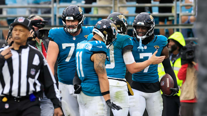 Jacksonville Jaguars wide receiver Brian Thomas Jr. (7) celebrates his touchdown score with quarterback Mac Jones (10) during the fourth quarter Sunday, Dec. 29, 2024 at EverBank Stadium in Jacksonville, Fla. The Jaguars held off the Titans 20-13. [Corey Perrine/Florida Times-Union]