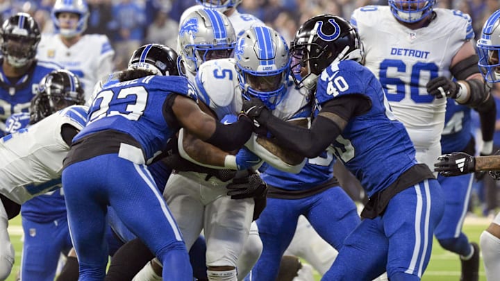 Detroit Lions running back David Montgomery (5) is tackled by Indianapolis Colts cornerback Jaylon Jones (40)
