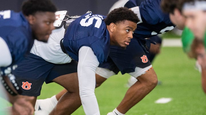 Auburn's Keldric Faulk and Ohio State's Caleb Downs were projected to land with the NFL's No. 30 defense in 2025