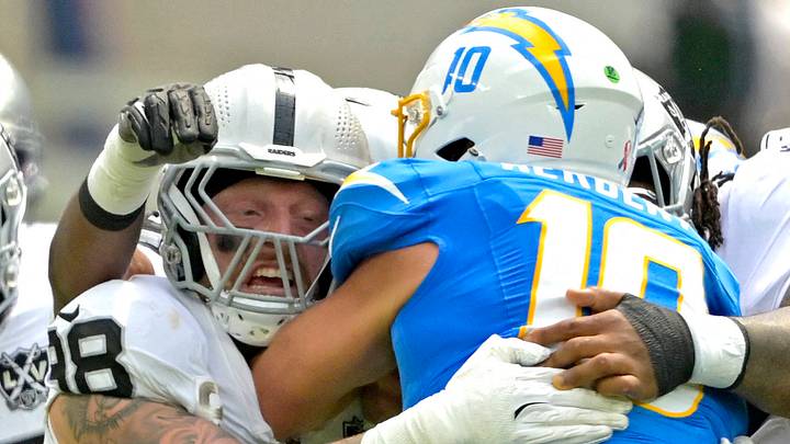 Los Angeles Chargers QB Justin Herbert and Las Vegas Raiders DE Maxx Crosby. Los Angeles Chargers QB Justin Herbert and Las Vegas Raiders DE Maxx Crosby.