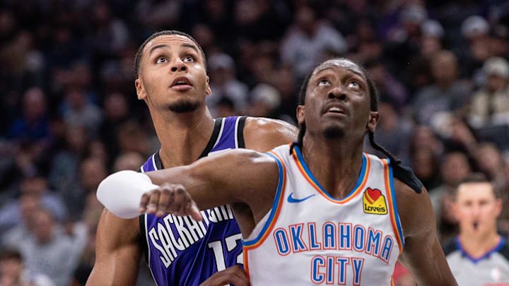 Nov 25, 2024; Sacramento, California, USA; Oklahoma City Thunder forward Jalen Williams (8) and Sacramento Kings forward Keegan Murray (13) fight for position under the basket during the second quarter at Golden 1 Center. Mandatory Credit: Ed Szczepanski-Imagn Images Nov 25, 2024; Sacramento, California, USA; Oklahoma City Thunder forward Jalen Williams (8) and Sacramento Kings forward Keegan Murray (13) fight for position under the basket during the second quarter at Golden 1 Center. Mandatory Credit: Ed Szczepanski-Imagn Images