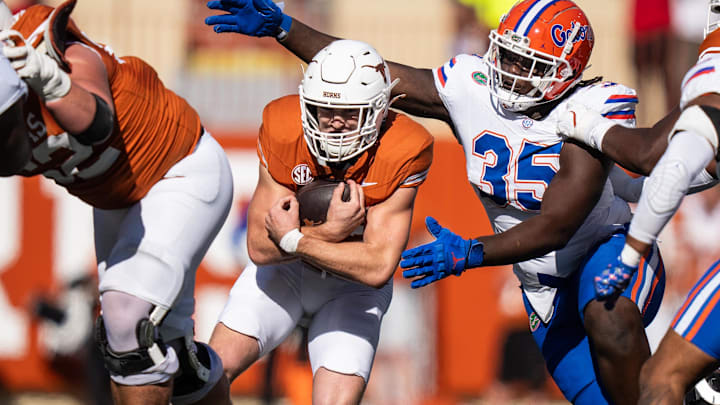 Texas Longhorns running back Colin Page carries the ball in the fourth quarter at Darrell K Royal-Texas Memorial Stadium. 