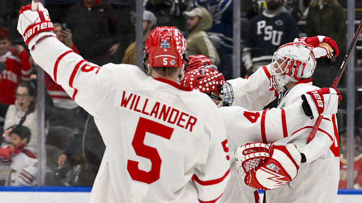 Apr 10, 2025; St. Louis, Missouri: Boston University celebrates after the Terriers defeated the Penn State Nittany Lions to advance to the 2025 national championship game.