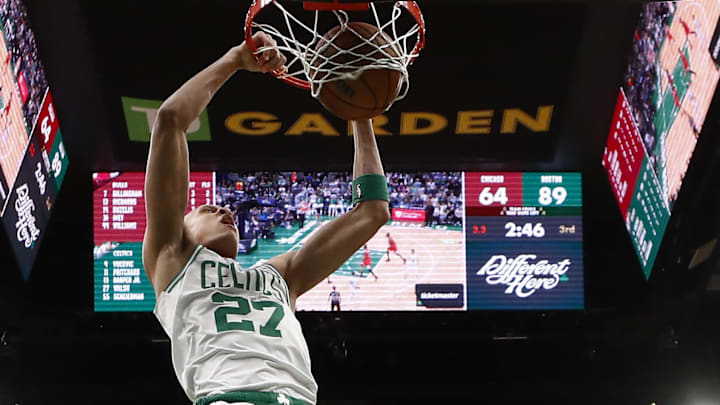 Feb 11, 2026; Boston, Massachusetts, USA; Boston Celtics guard Jordan Walsh (27) dunks over Chicago Bulls guard Jaden Ivey (31) during the second half at TD Garden. Mandatory Credit: Winslow Townson-Imagn Images