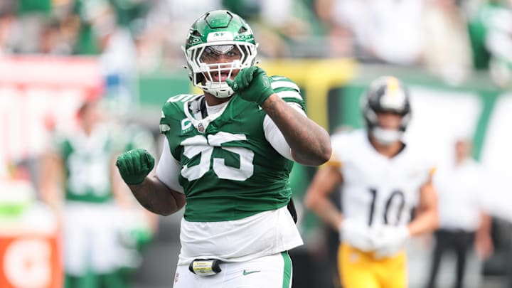 Sep 7, 2025; East Rutherford, New Jersey, USA; New York Jets defensive tackle Quinnen Williams (95) celebrates a defensive stop during the fourth quarter against the Pittsburgh Steelers at MetLife Stadium. Mandatory Credit: Vincent Carchietta-Imagn Images