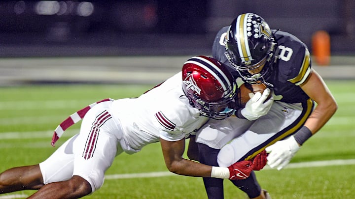 Fort PayneÕs Brannon Oliver tries to evade the tackle of Gadsden CityÕs Zyan Gibson during high school football action in Fort Payne, Alabama October 11, 2024. (Dave Hyatt / Special to the Gadsden Times)