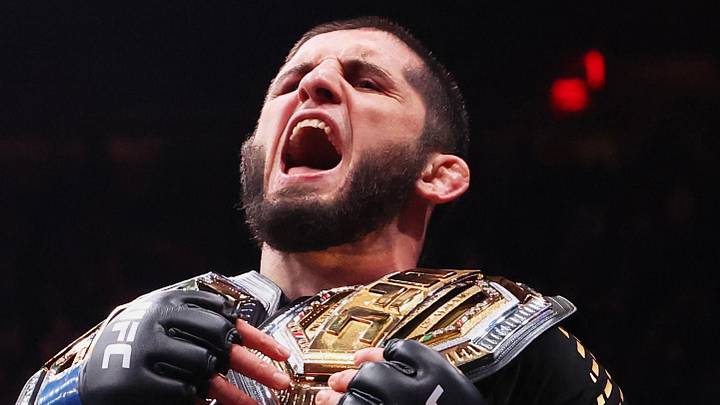 Nov 15, 2025; New York, NY, UNITED STATES; Islam Makhachev (blue gloves) celebrates after defeating Jack Della Maddalena (not pictured) by unanimous decision in the welterweight championship bout during UFC 322 at Madison Square Garden. Mandatory Credit: Ed Mulholland-Imagn Images