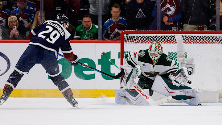 Mar 8, 2026; Denver, Colorado, USA; Colorado Avalanche center Nathan MacKinnon (29) scores a shootout goal against Minnesota Wild goaltender Jesper Wallstedt (30) at Ball Arena. Mandatory Credit: Isaiah J. Downing-Imagn Images