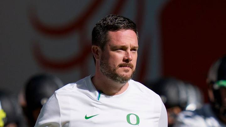 Oregon head coach Dan Lanning takes the field with his team for warmups as the Oregon Ducks take on the Texas Tech Red Raiders in the Orange Bowl on Jan. 1, 2026, at Hard Rock Stadium in Miami, Florida.