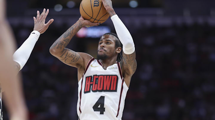 Feb 25, 2025; Houston, Texas, USA; Houston Rockets guard Jalen Green (4) shoots the ball during the second quarter against the Milwaukee Bucks at Toyota Center. Mandatory Credit: Troy Taormina-Imagn Images