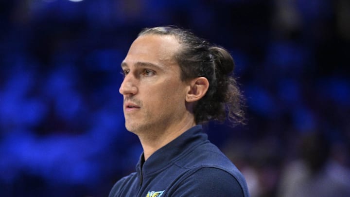 Dallas Wings head coach Chris Koclanes looks on during the second half against the New York Liberty.