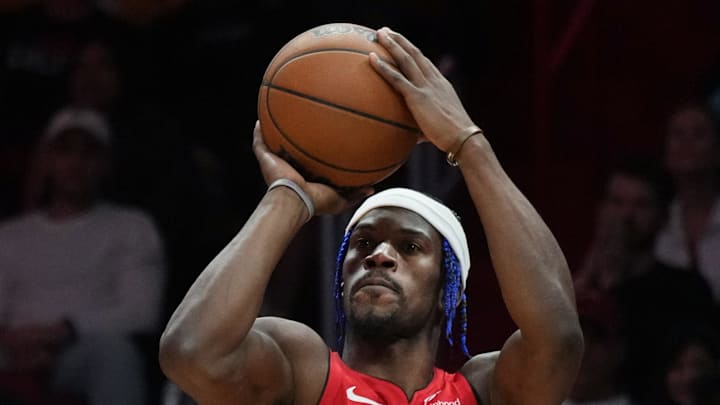 Dec 7, 2024; Miami, Florida, USA; Miami Heat forward Jimmy Butler (22) shoots the ball against Phoenix Suns guard Grayson Allen (8) during the second half at Kaseya Center. Mandatory Credit: Jim Rassol-Imagn Images Dec 7, 2024; Miami, Florida, USA; Miami Heat forward Jimmy Butler (22) shoots the ball against Phoenix Suns guard Grayson Allen (8) during the second half at Kaseya Center. Mandatory Credit: Jim Rassol-Imagn Images