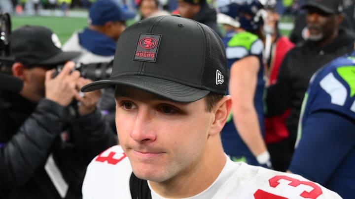 San Francisco 49ers quarterback Brock Purdy leaves the field after a loss