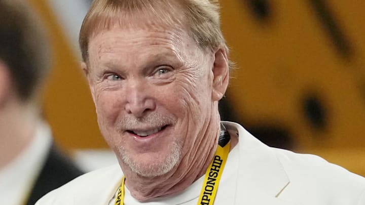 Jan 19, 2026; Miami Gardens, FL, USA; Las Vegas Raiders owner Mark Davis walks on the sideline before the CFP National Championship college football game between the Indiana Hoosiers and the Miami Hurricanes at Hard Rock Stadium. Mandatory Credit: Kirby Lee-Imagn Images