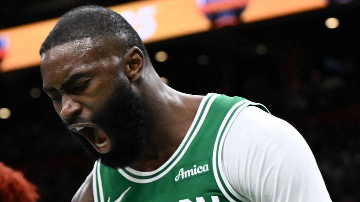 Apr 21, 2026; Boston, Massachusetts, USA; Boston Celtics guard Jaylen Brown (7) reacts after being folded by Philadelphia 76ers guard Kelly Oubre Jr. (9) in the second half of a game two of the first round of the 2026 NBA Playoffs at TD Garden. Mandatory Credit: Brian Fluharty-Imagn Images