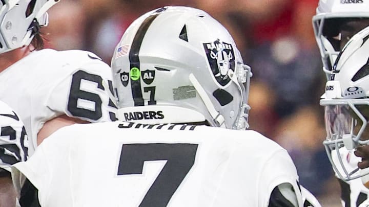 Dec 21, 2025; Houston, Texas, USA; Las Vegas Raiders quarterback Geno Smith (7) stands in the huddle with offensive tackle Stone Forsythe (70), running back Ashton Jeanty (2), wide receiver Jack Bech (18) and tight end Brock Bowers (89) during the second quarter against the Houston Texans at NRG Stadium. Mandatory Credit: Thomas Shea-Imagn Images