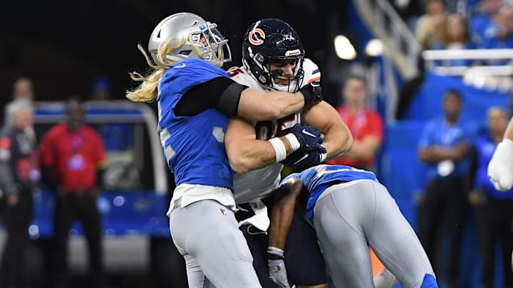 Cole Kmet hauls in a pass over the middle against Detroit's defense and linebacker Alex Anzalone. Cole Kmet hauls in a pass over the middle against Detroit's defense and linebacker Alex Anzalone.