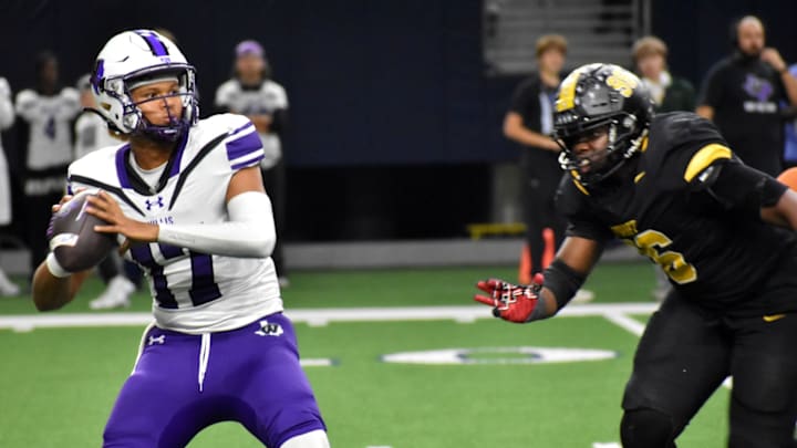 Willis quarterback Lincoln Fraziers delivers a throw while being pressured by a Forney defender in a game on Nov. 29 at the Ford Center in Frisco.