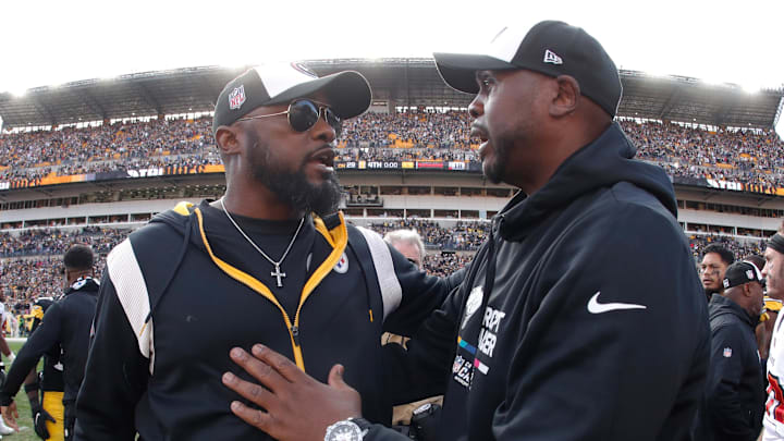 Pittsburgh Steelers head coach Mike Tomlin (left) and former Buccaneers defensive line coach Kacy Rodgers (right) 