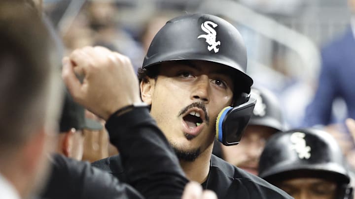 Mar 30, 2026; Miami, Florida, USA; Chicago White Sox first baseman Miguel Vargas (20) is greeted in the dugout by teammates after his grand slam against the Miami Marlins during the fourth inning at loanDepot Park. Mandatory Credit: Rhona Wise-Imagn Images Mar 30, 2026; Miami, Florida, USA; Chicago White Sox first baseman Miguel Vargas (20) is greeted in the dugout by teammates after his grand slam against the Miami Marlins during the fourth inning at loanDepot Park. Mandatory Credit: Rhona Wise-Imagn Images