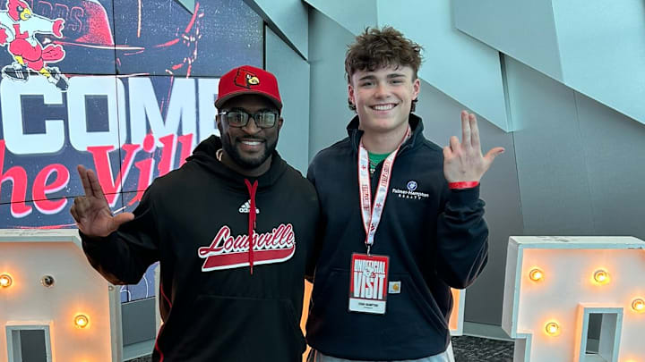 Louisville running backs coach Chris Barclay and Owensboro (Ky.) HS running back Evan Hampton Louisville running backs coach Chris Barclay and Owensboro (Ky.) HS running back Evan Hampton