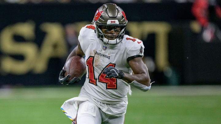 Oct 13, 2024; New Orleans, Louisiana, USA; Tampa Bay Buccaneers wide receiver Chris Godwin (14) runs in for a touchdown during the third quarter against the New Orleans Saints at Caesars Superdome. Mandatory Credit: Matthew Hinton-Imagn Images