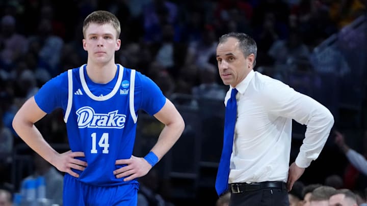 Mar 22, 2025; Wichita, KS, USA; Drake Bulldogs guard Bennett Stirtz (14) talks with head coach Ben McCollum during the second half at Intrust Bank Arena. Mandatory Credit: Kirby Lee-Imagn Images