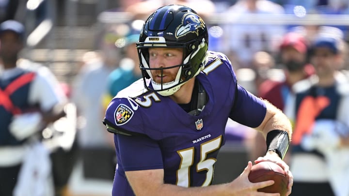 Baltimore Ravens quarterback Cooper Rush moves in the pocket during the second quarter against the Houston Texans. Baltimore Ravens quarterback Cooper Rush moves in the pocket during the second quarter against the Houston Texans.