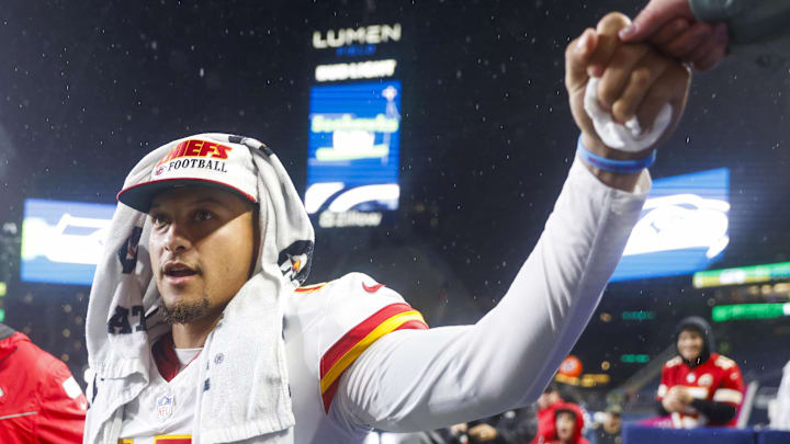 Aug 15, 2025; Seattle, Washington, USA; Kansas City Chiefs quarterback Patrick Mahomes (15) bumps fists with a fan following a loss against the Seattle Seahawks at Lumen Field. Mandatory Credit: Joe Nicholson-Imagn Images