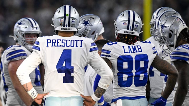 Dallas Cowboys quarterback Dak Prescott and wide receiver CeeDee Lamb in the huddle before a game against the Philadelphia Eagles 