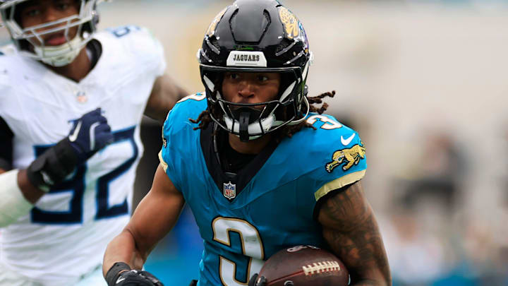 Jacksonville Jaguars wide receiver Jakobi Meyers (3) rushes for yards during the fourth quarter of an NFL football matchup at EverBank Stadium, Sunday, Jan. 4, 2026, in Jacksonville, Fla. The Jaguars defeated the Titans 41-7, capturing the AFC South title. 