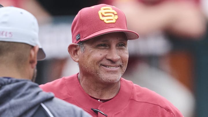 May 31, 2025; Corvallis, OR, USA; USC head coach Andy Stankiewicz visits with official before a game against Saint Mary's at the NCAA Corvallis Regional at Goss Stadium. Mandatory Credit: Troy Wayrynen-Imagn Images